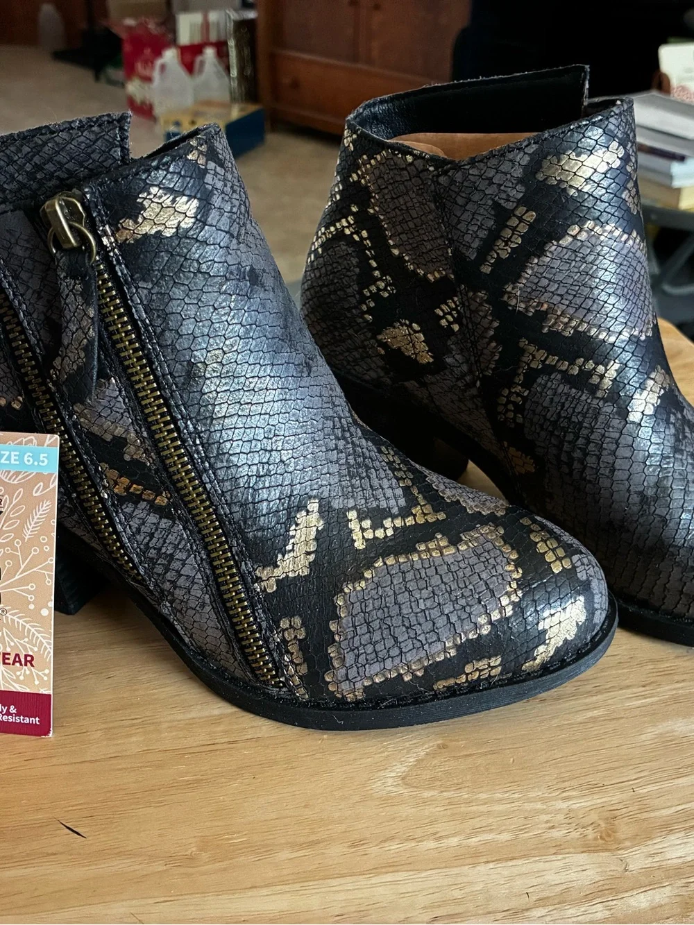 Muk Luks Metallic Black and Gold Snake-Print Ankle Booties